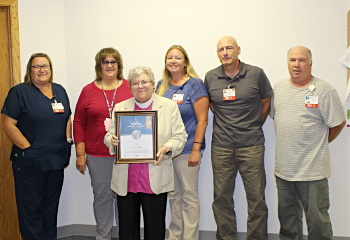 Aspirus At Home team photo with award